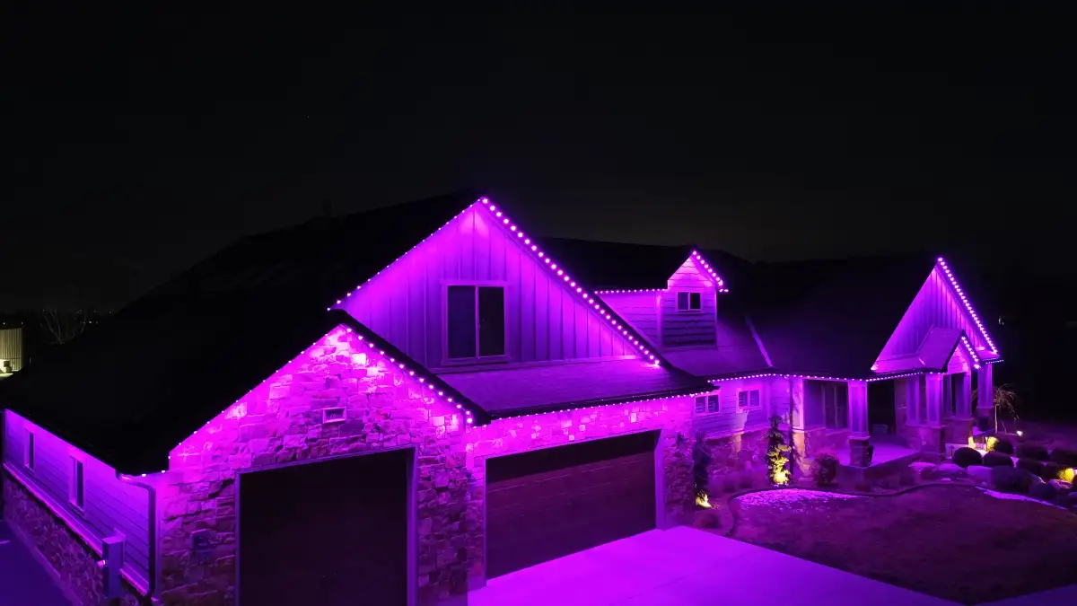Red and green holiday lights on a home exterior