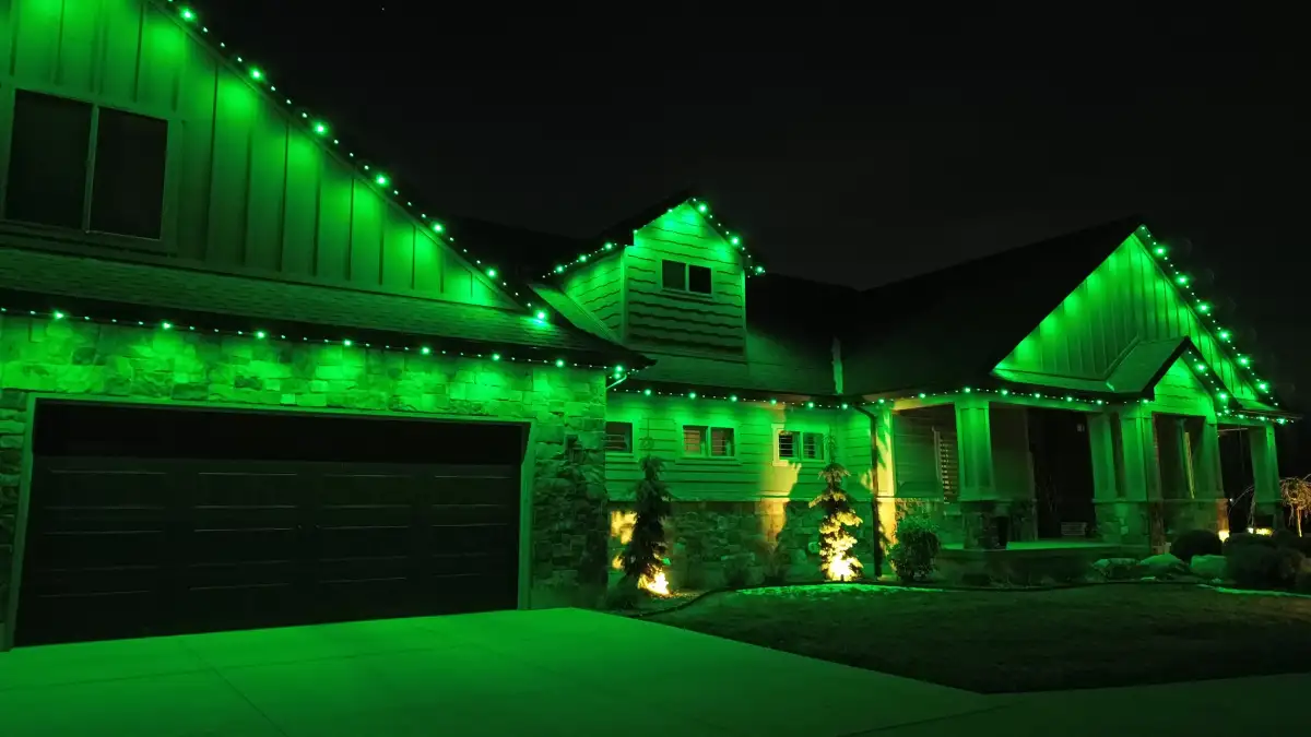 Holiday lighting installation on a Midlands home